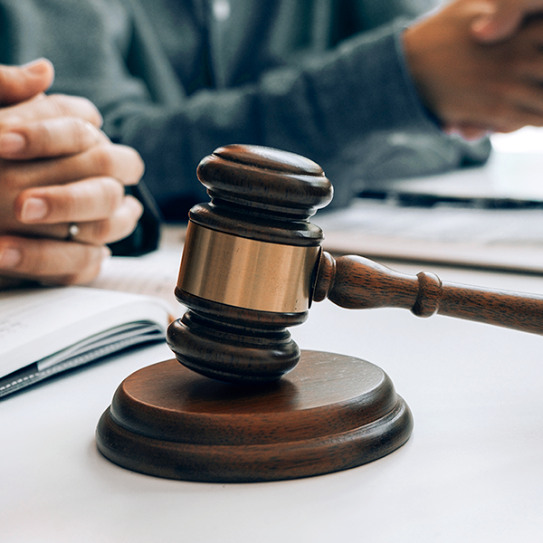 Gavel on a desk during a legal consultation